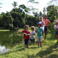 kids enjoy playing near the lake