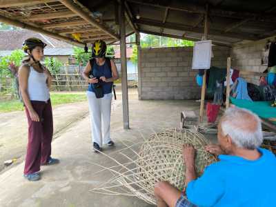 Watching bamboo basket weaving