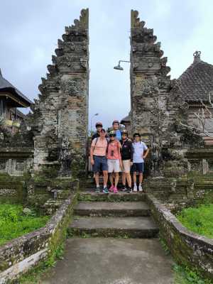 Posing in front of the village temple