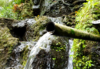 bidadari waterfall bamboo water pipe